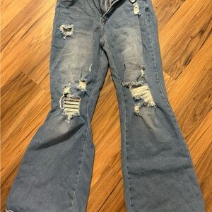 Distressed Blue Jeans